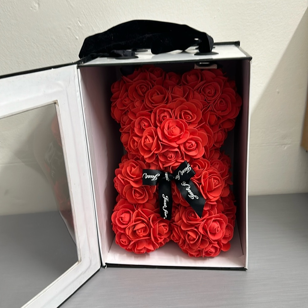 Flower teddy bear.